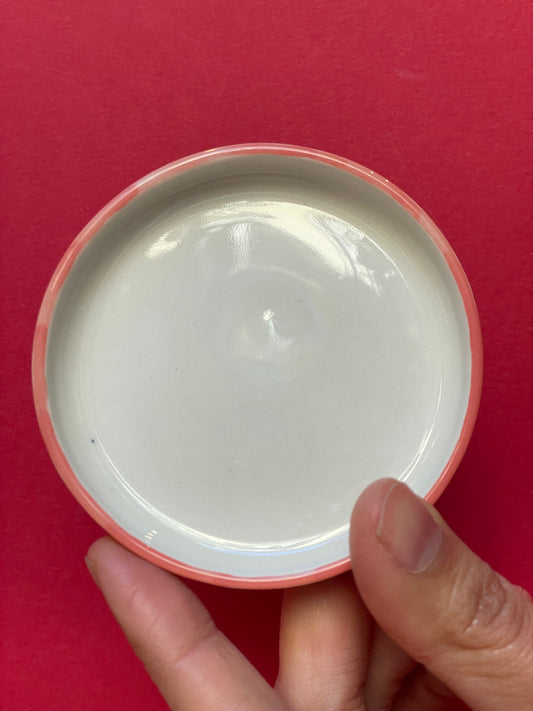 Piattino porcellana bordo Corallo